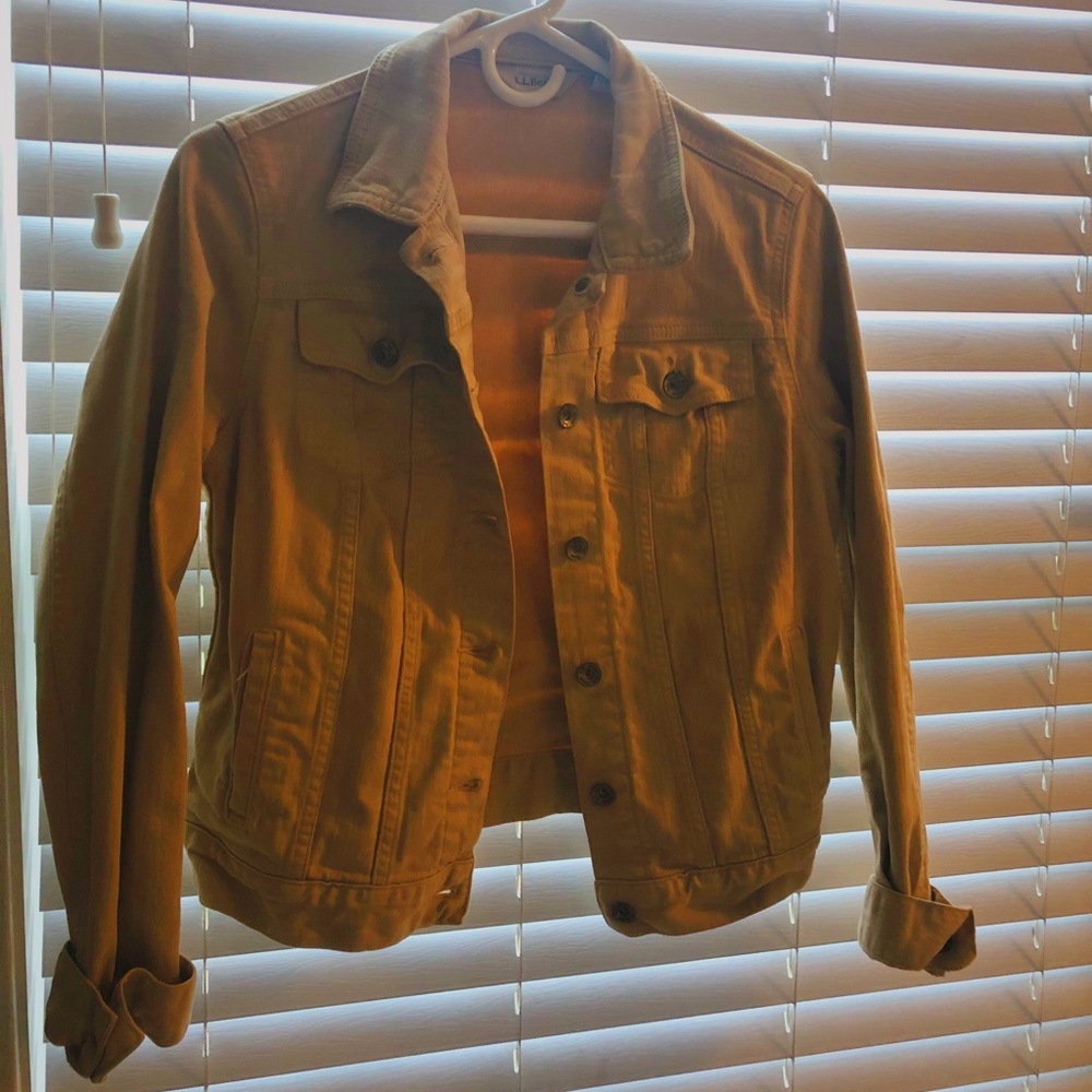 A cute tan jean jacket.